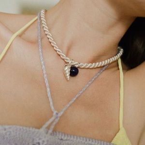 Wolf circus silk and silver necklace